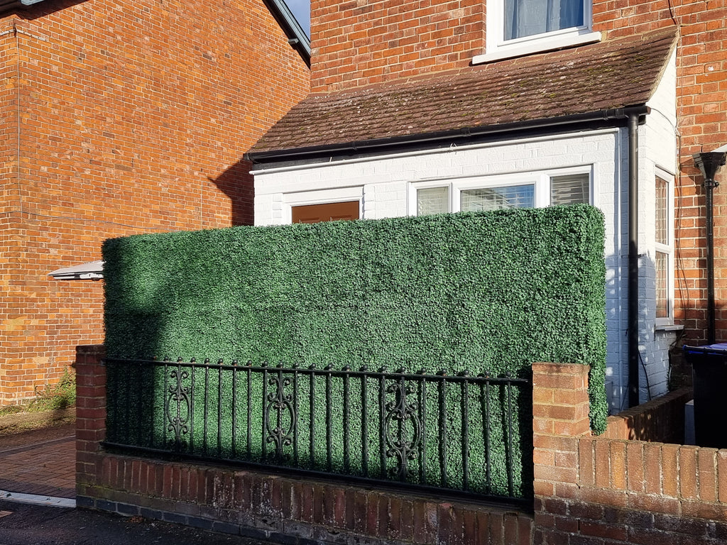 Use artificial hedge to create a privacy screen