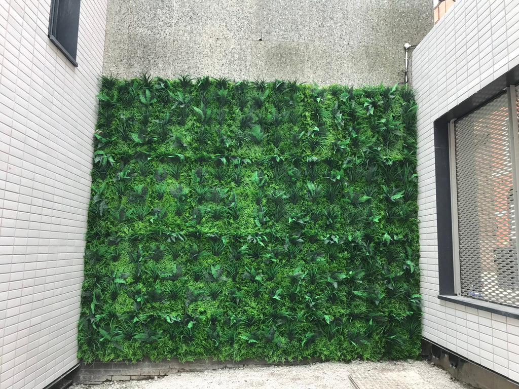 Cover an ugly wall with expanding artificial hedge trellis